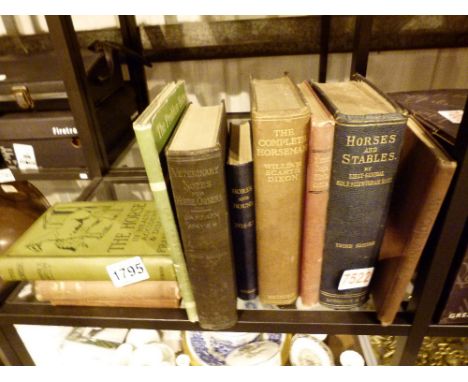 Shelf of vintage horse related books