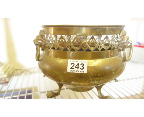 Brass 1920's planter on tripod supports with 3 Lion head rim handles