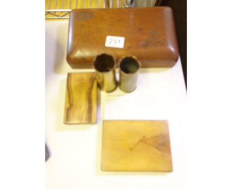 Pair of Trench Art small vases, a vintage carved cigarette box, the top carved with a Military emblem for Tank Regiment, and 