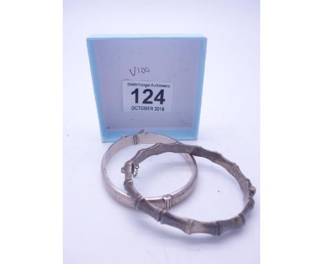 Bark shaped Edwardian silver bangle and 1 other engraved silver bangle 