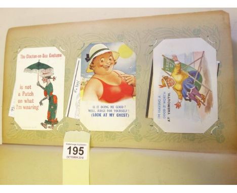 Large postcard album containing vintage seaside humour postcards, 150 postcards approx, varying conditions, 