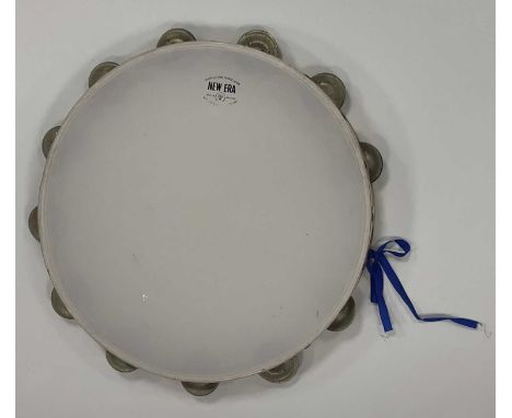 A wooden tambourine with 'New Era' skin, diameter approx 12", thrown out into the crowd at a T.Rex concert at Manchester Apol