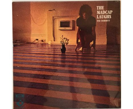 A very clean condition original UK copy of the first 1970 LP from Syd Barrett. The record (SHVL 765, unboxed Harvest labels, 