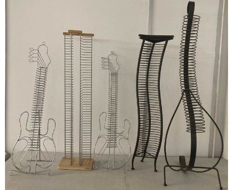 CD RACKS. Five decorative CD racks. This lot would require collection and is not suitable for packing / shipping services.