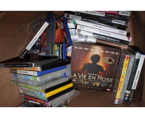 A BOX OF DVDS AND CONSOLE GAMES ETC.