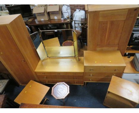 A COLLECTION OF RETRO LIGHT OAK UTILITY FURNITURE TO INCLUDE SINGLE WARDROBE, DRESSING TABLE, CHEST, FOLDING TABLE AND BEDSID