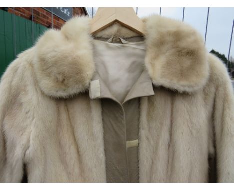 A VINTAGE CREAM / PEARL MINK FUR AND LEATHER COAT, fully lined, velcro fasteners, approx size 36"Condition Report:Missing bel