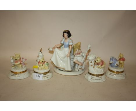 FOUR WINNIE THE POOH TRINKET BOXES BY LENOX, TOGETHER WITH A LENNOX SNOW WHITE AND THE SEVEN DWARVES CANDLESTICK