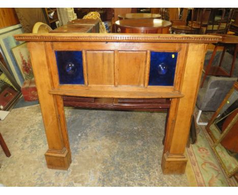 A VINTAGE FIRE SURROUND WITH BULLSEYE GLASS H-131 W-142 CM