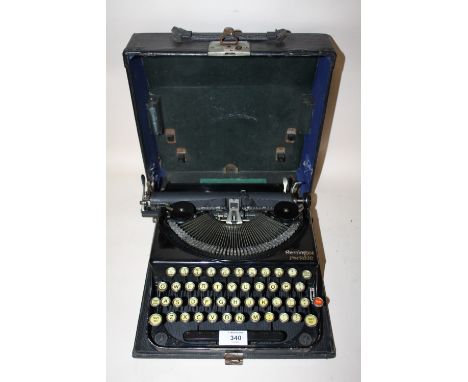 A VINTAGE REMINGTON POTABLE TYPEWRITER