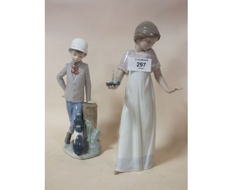 TWO&nbsp;NAO&nbsp; FIGURES OF A GIRL WITH A CHAMBER STICK AND A BOY WITH A DOG, WITHOUT MODEL NUMBERS