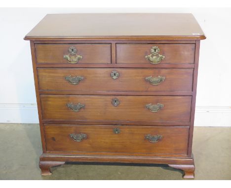 A Georgian walnut small chest with two short over three long drawers on bracket feet with brass handles - Width 86cm x Height