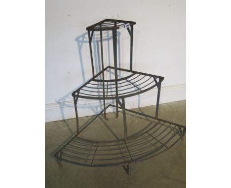 A Vintage metal 3-tier corner plant stand, with semi-circular front 