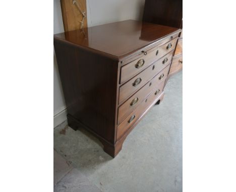 A Georgian mahogany chest with a slide above four graduating drawers on bracket feet - 81cm  tall x 97cm x 55cm - in good res