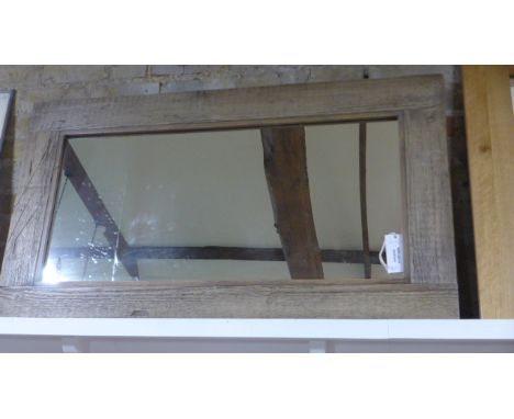 A rustic wooden framed mirror - 68cm x 119cm 