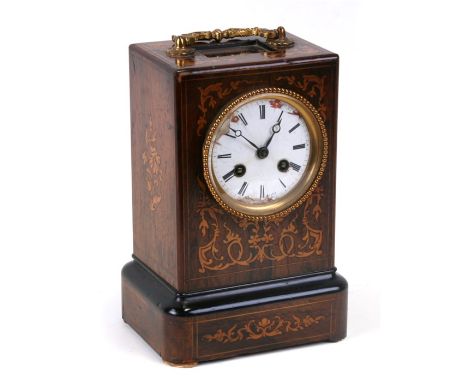 A late 19th century inlaid rosewood French mantle clock, the white enamel dial with Roman numerals, 23cms (9ins) high; togeth