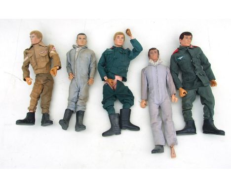 A quantity of Action Man figures; together with three Action Man vehicles to include a helicopter and a large quantity of clo