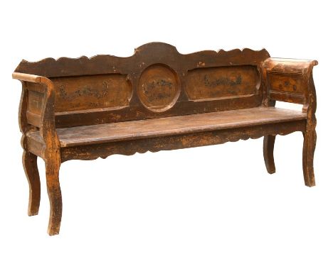 An Eastern European painted pine bench / settle with traces of original finish, with scroll arms, solid back and seat, on sab