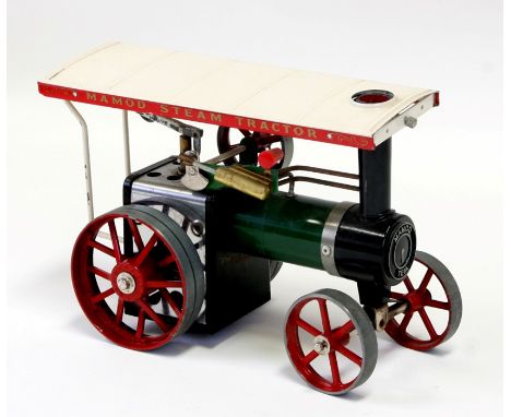 A Mamod steam tractor, 25cms (10ins) long, boxed.