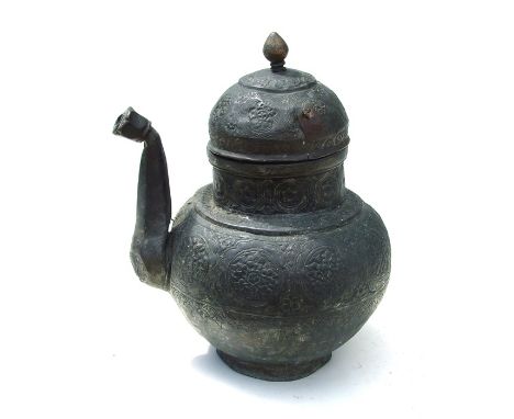 A Tibetan / Islamic tinned copper teapot, 28cms (11ins) high.