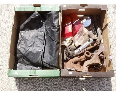 A Triumph Vitesse Tonneau, hood cover, rear light lenses and other Triumph Vitesse spares (2 boxes).