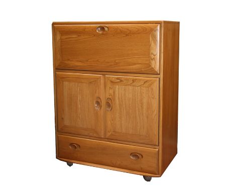 An Ercol Windsor bureau chest with fall-front revealing a fitted interior above two panelled doors, above a single drawer, ap