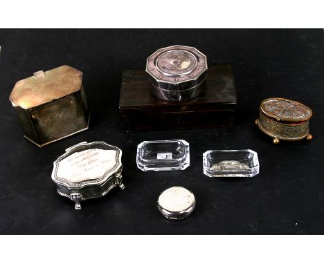 A silver plated tea caddy of hexagonal form; together with six other boxes (7).