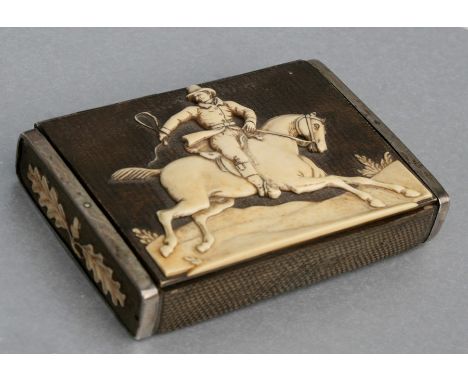A 19th century German white metal mounted antler horn snuff box, the top carved with a gentleman on horseback with acorns and