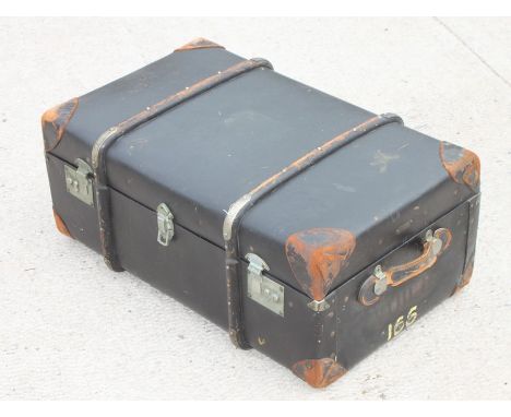 A black leather cloth travelling trunk,with leather reinforced corners and twin carrying handles, patent no. 321623, 75 cm, 2