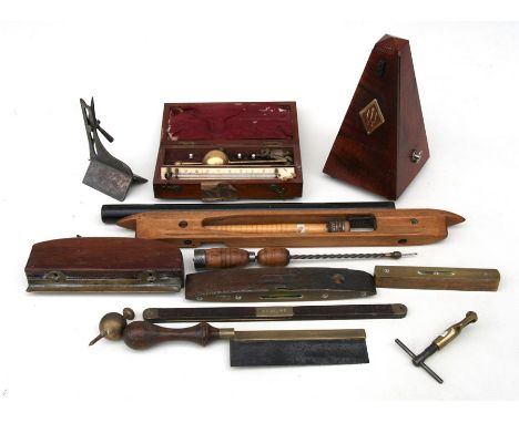 A Sikes Hydrometer, boxed; together with a German metronome; and a selection of antique tools.