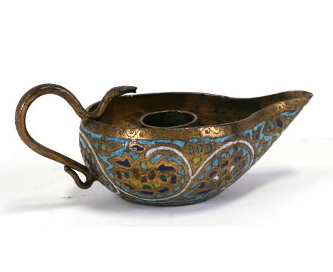 A Persian gilt metal and enamel candlestick with snake form handle, 14cms (5.5ins) wide.