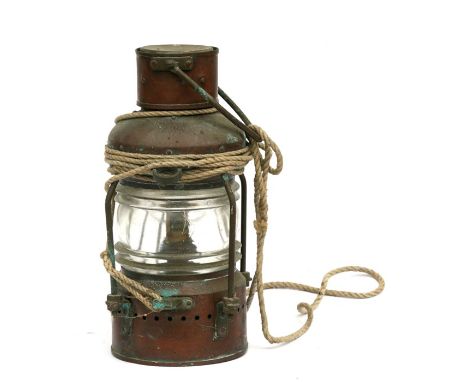 A copper ship's light, 24cms (9.5ins) high.