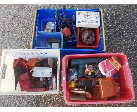 A quantity of assorted workshop and car spares including rear light lenses, gauges, reflectors, ignition components and other