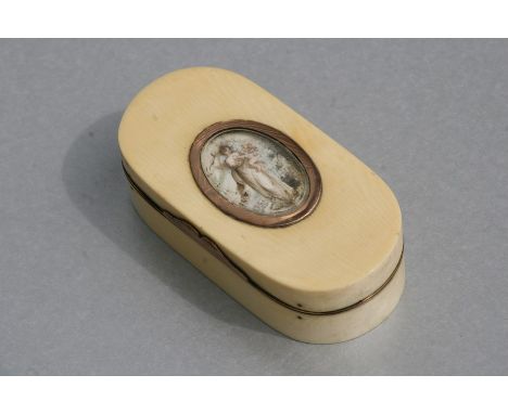A Georgian ivory yellow metal mounted snuff box, the top with oval portrait miniature depicting a classical female holding a 