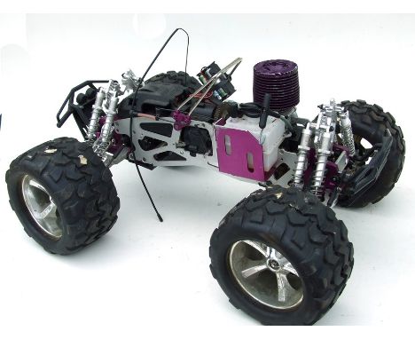 A HPI 1-5 scale racing buggy chassis with single cylinder engine, approx 52cms (20.5ins) long.