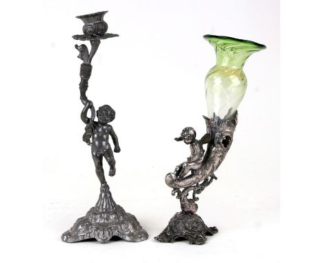 A silver plated cornucopia single flute epergne mounted with a cherub, 22cms (8.75ins) high; together with a similar candlest