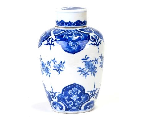 A Chinese blue & white tea caddy and cover decorated with prunus, approx 22cms (8.5ins) high.Condition ReportVery good condit