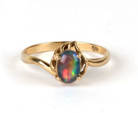 A 9ct gold ring set with an opal doublet, weight 1.6g, approx UK size 'N'.