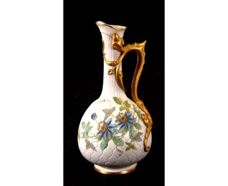 A Royal Worcester Aesthetics period ewer with tube lined decoration in the form of passionflowers, puce mark for 1877, 33cms 