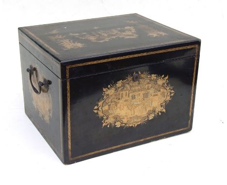 A 19th century Chinese Export black lacquer tea caddy decorated with gilded panels depicting figures in landscapes, with pewt