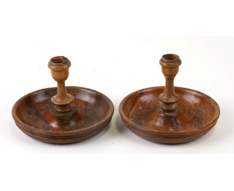 A Jerusalem olivewood 'Brighton Bun' travelling candlestick.
