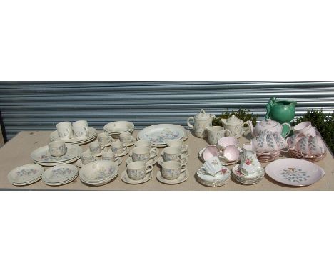 A Poole Pottery Springtime six-person tea and dinner service; together with a Sylvac pottery jug and other ceramics.