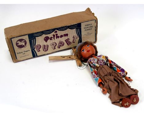 A Pelham Puppet - Cow Girl - boxed.Condition Reportbox lid split on one corner plus scuffs and knocks.&nbsp; puppet and cloth
