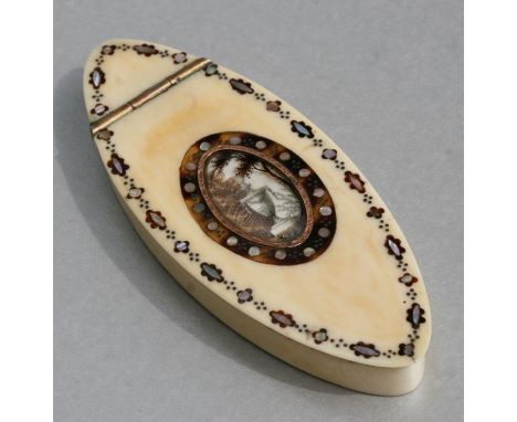 An 18th century ivory snuff box of navette form inlaid with yellow metal, tortoiseshell and mother of pearl with central oval