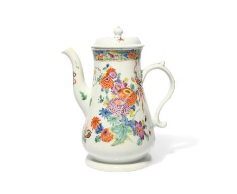 A rare and early Worcester coffee pot and cover, c.1752-53, the baluster shape derived from silver, painted in the Oriental s