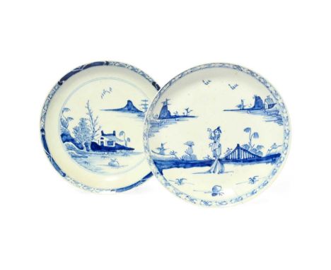 Two Vauxhall blue and white saucers, c.1755-57, one painted with a Chinese figure walking through a garden, the other with a 