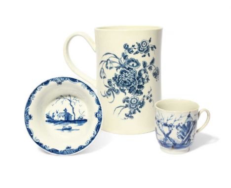 A Worcester blue and white patty pan and a mug , c.1760- 70, the patty pan painted with the Bare Tree and Speared Bird patter