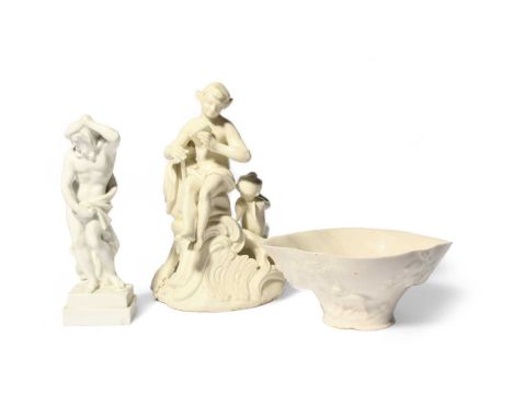 A Tournai figure group, c.1760, modelled with an impish figure, possibly Daphnis, playing the pan pipes and seated on a rocky