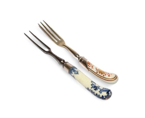 A silver-mounted Chelsea fork, c.1760, the haft of pistol form and decorated with flower sprays in gilt and red, and a St Clo