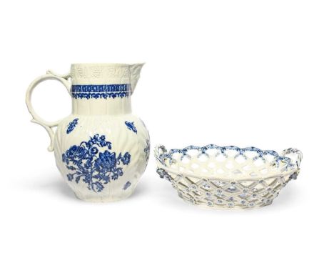 A large Seth Pennington (Liverpool) blue and white cabbage leaf jug, c.1780, decorated with naturalistic flower sprays and fl